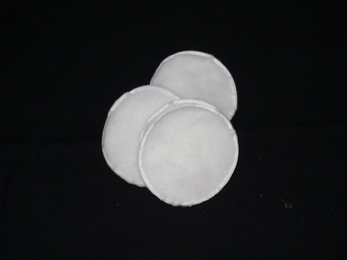 Photograph representing clear cotton storage jars